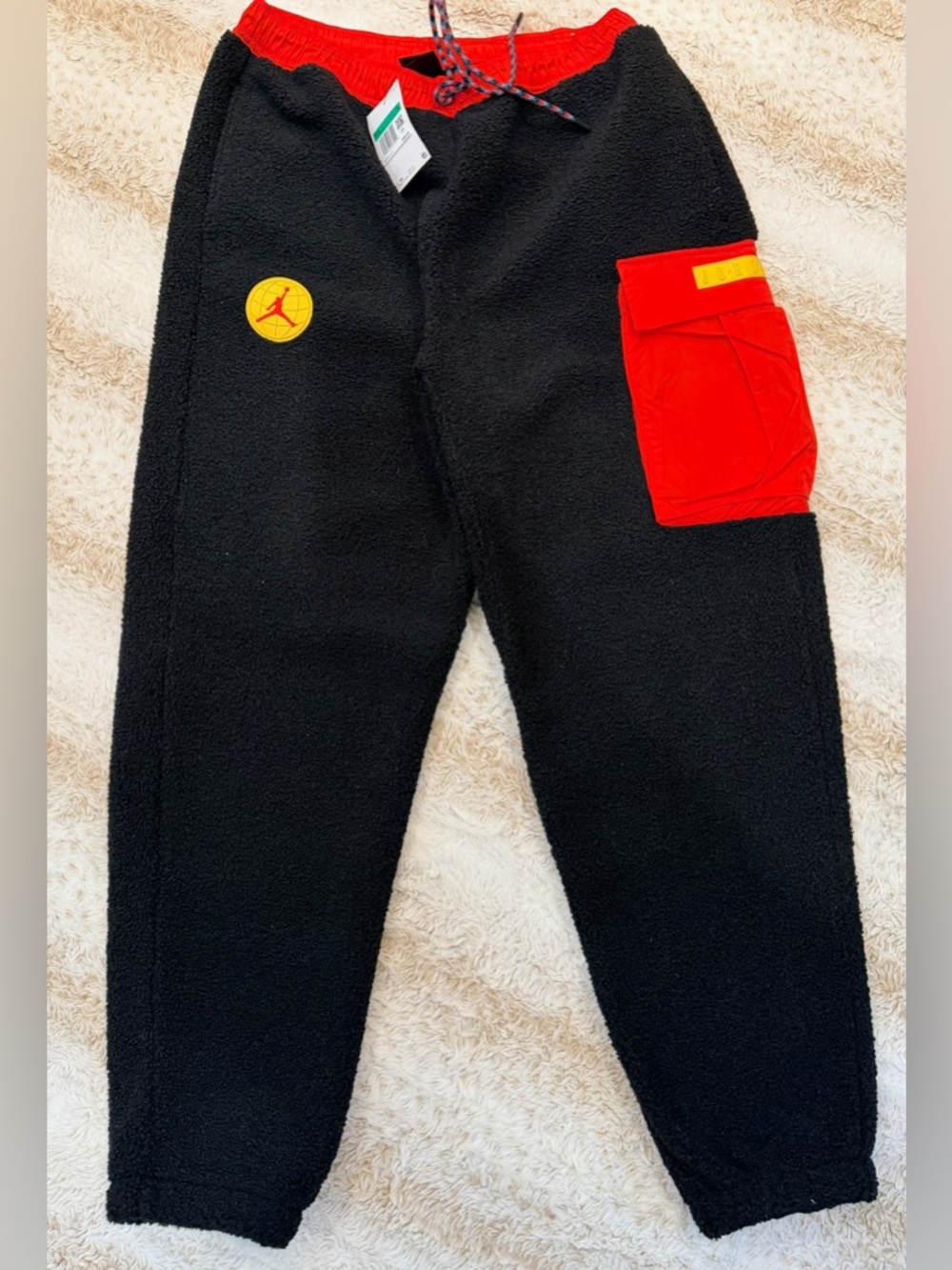 Jordan Black Fleece Joggers with Red Cargo Pocket and Yellow Patch
